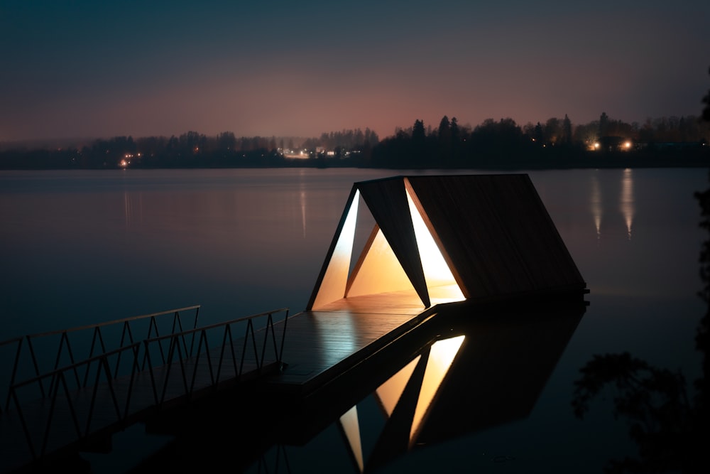 brown wooden dock at night