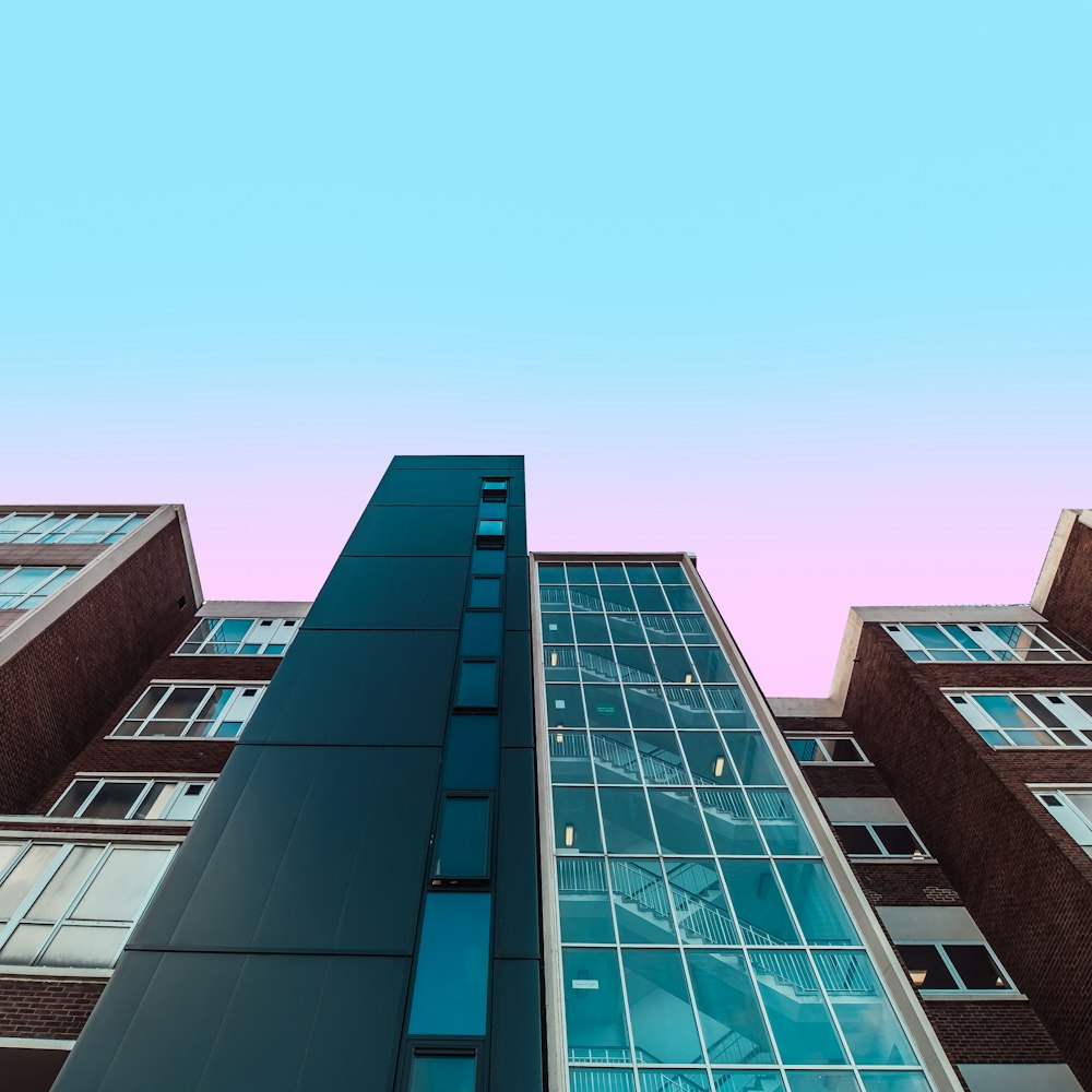 curtain wall high-rise building during daytime