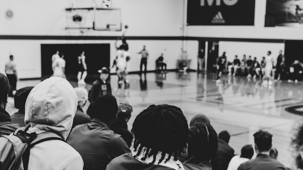 grayscale photo of a basketball game