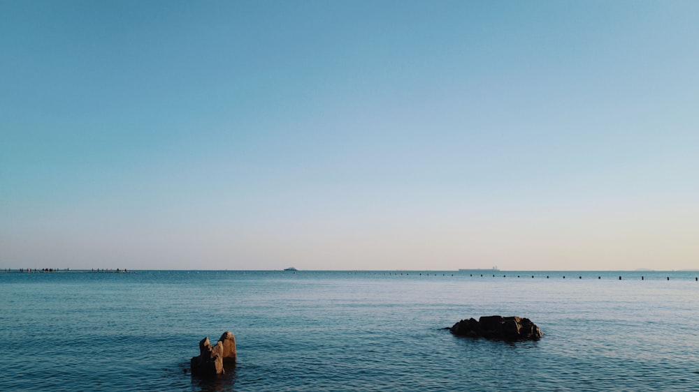 calm body of water during daytime