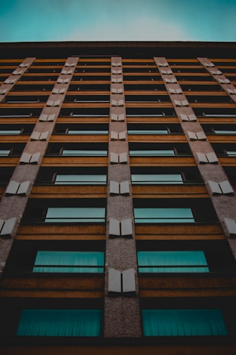 low-angle photo of high-rise building during daytime