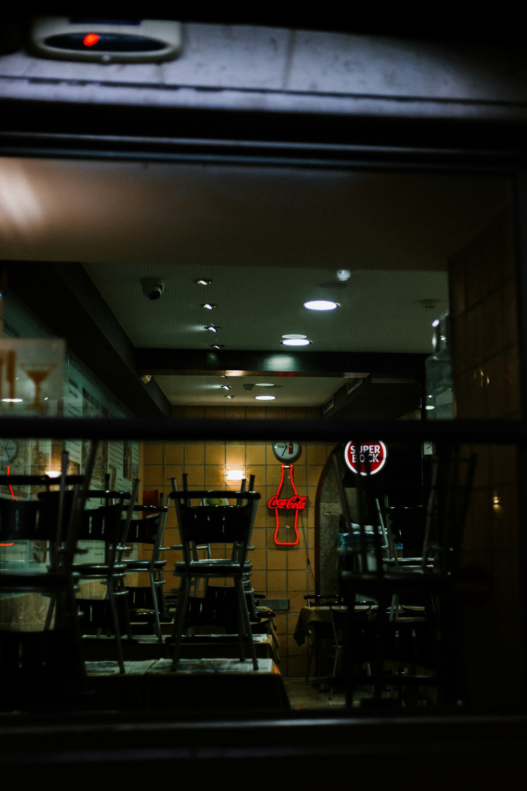 black wooden chairs in an empty restaurant