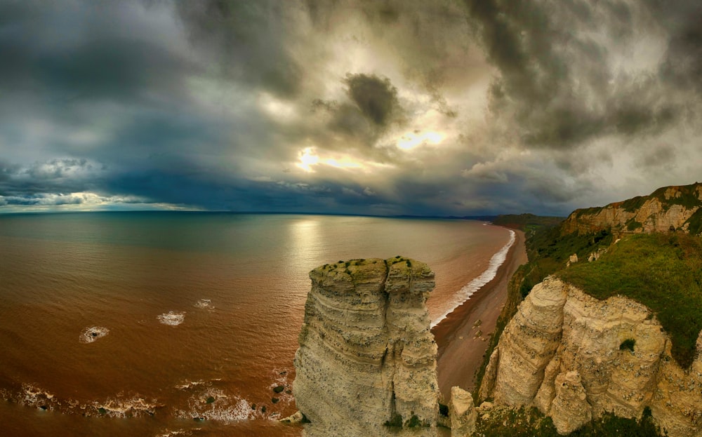 aerial view of rock formation near sea