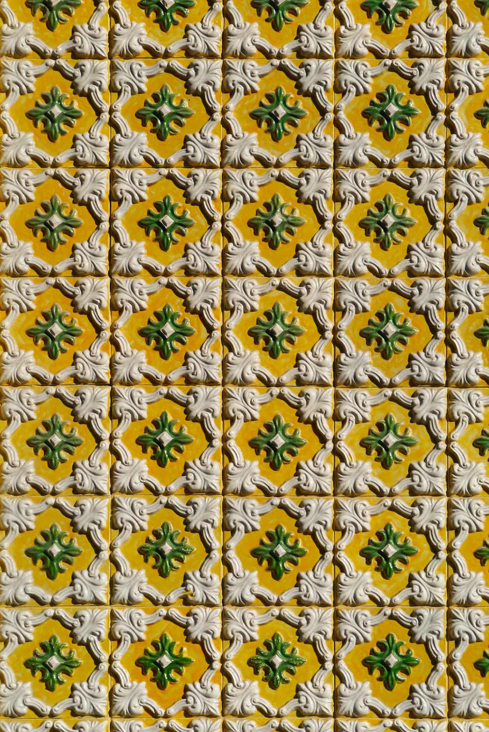 white, green, and yellow floral board