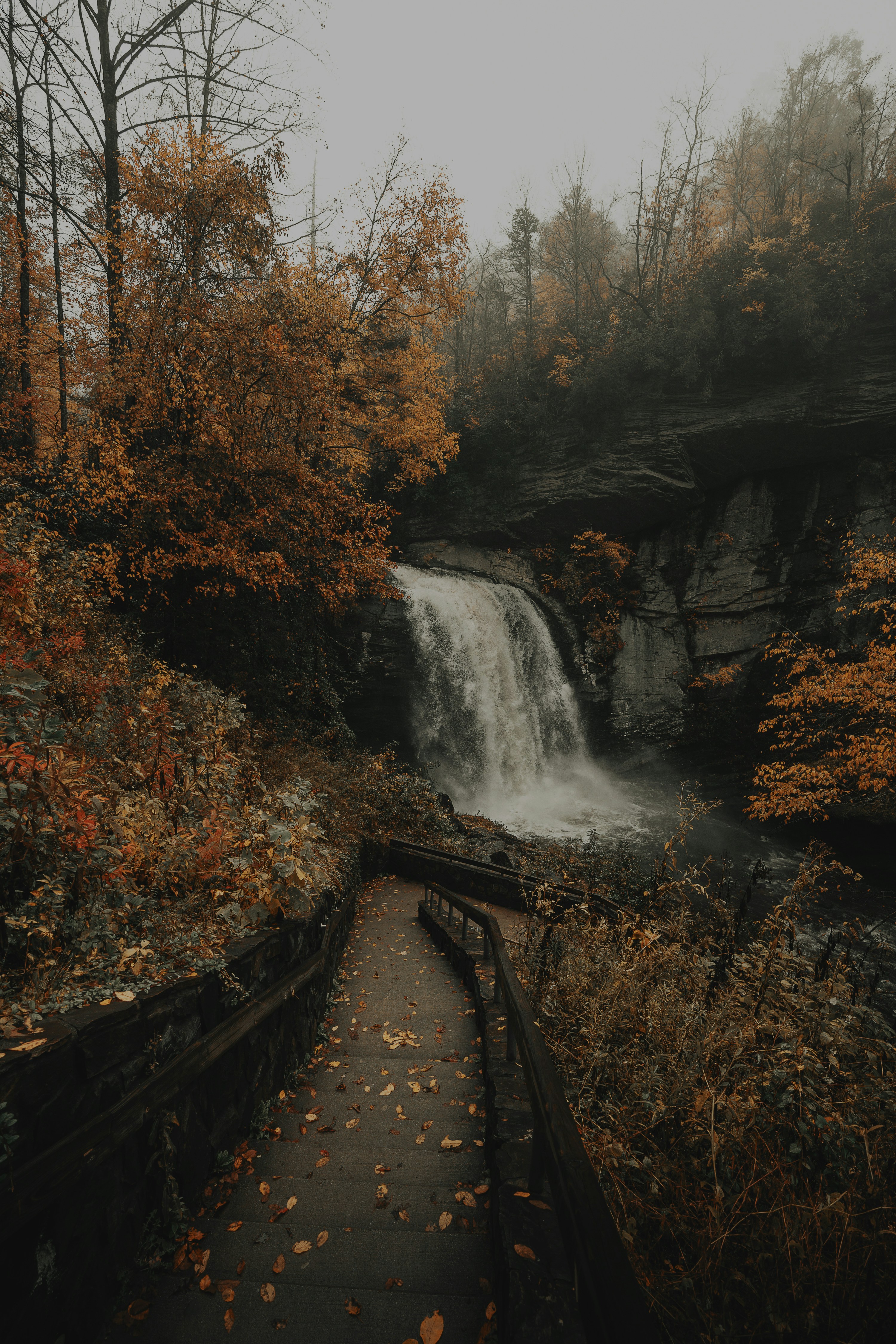 waterfalls under gray sky