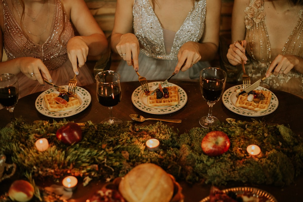 three women slicing waffles