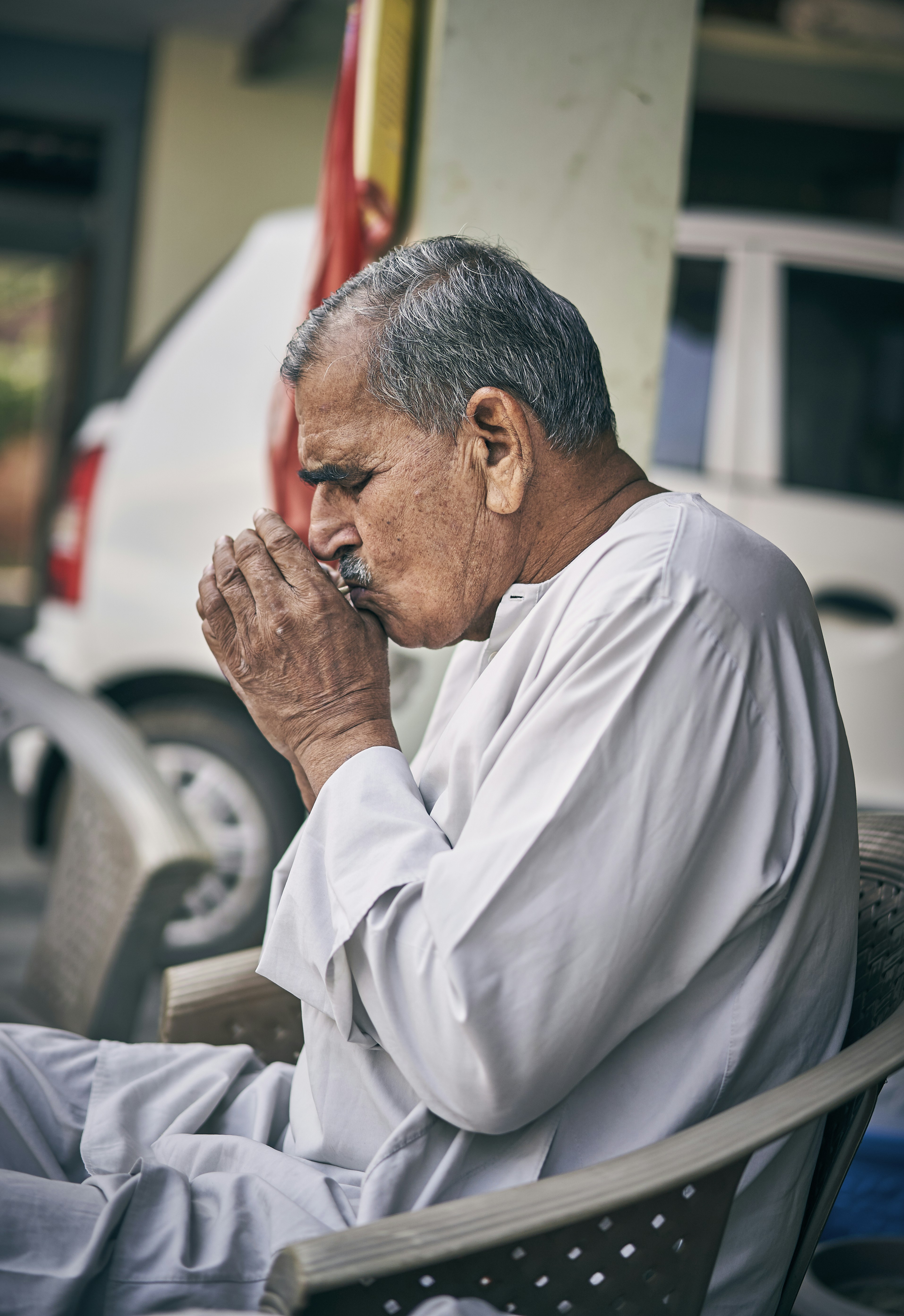 man sitting on chair
