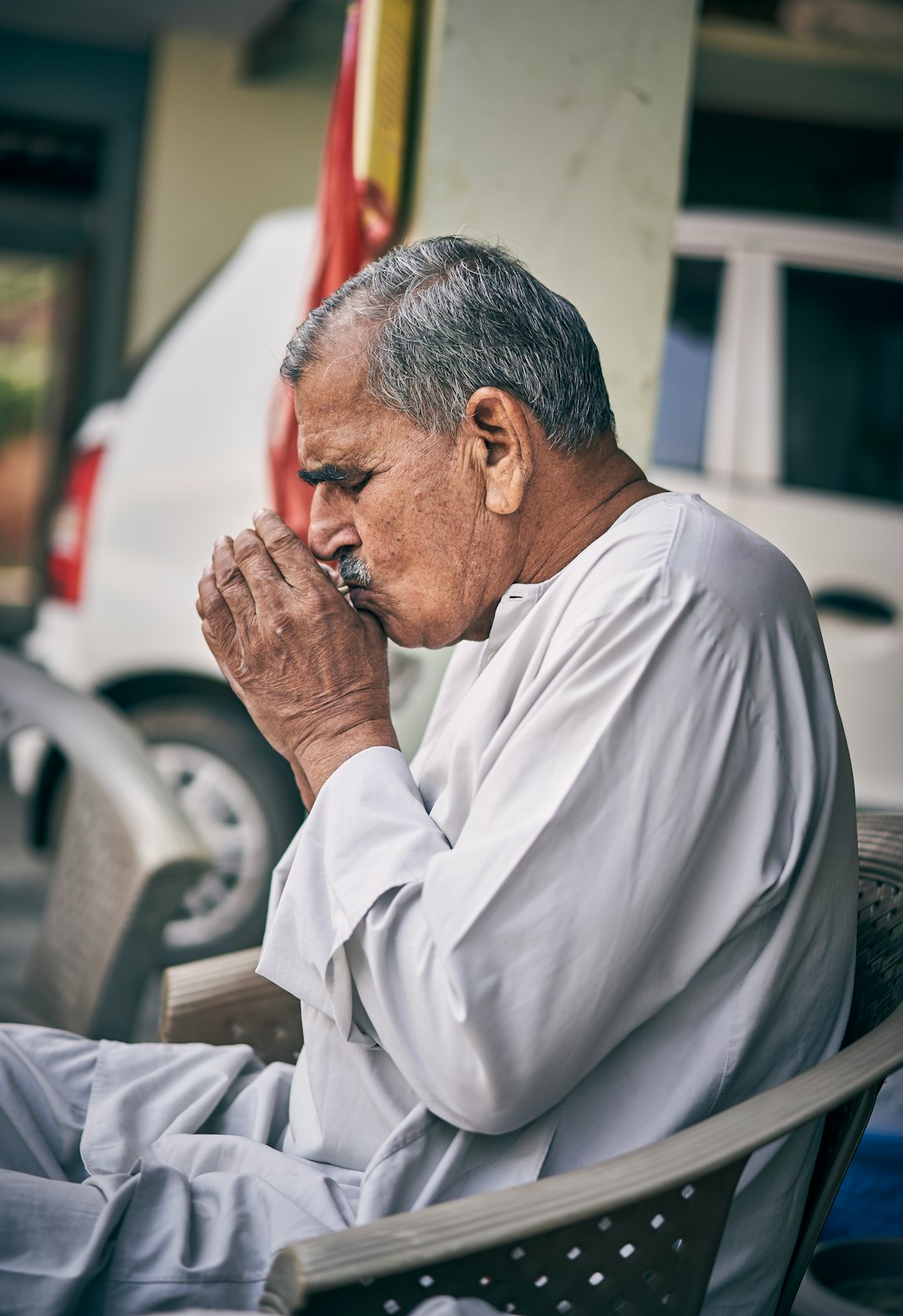 man sitting on chair