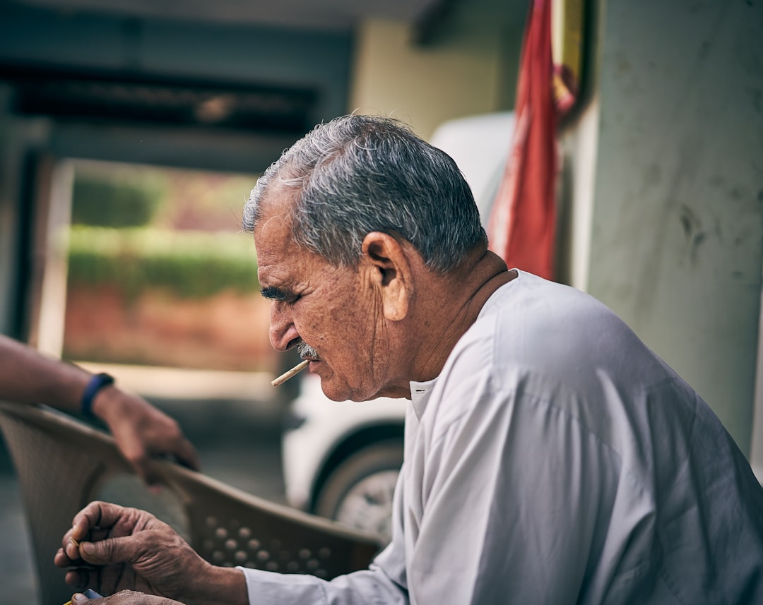 man wearing white long-sleeved shirt