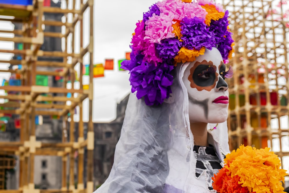 person wearing flowers near scaffolding