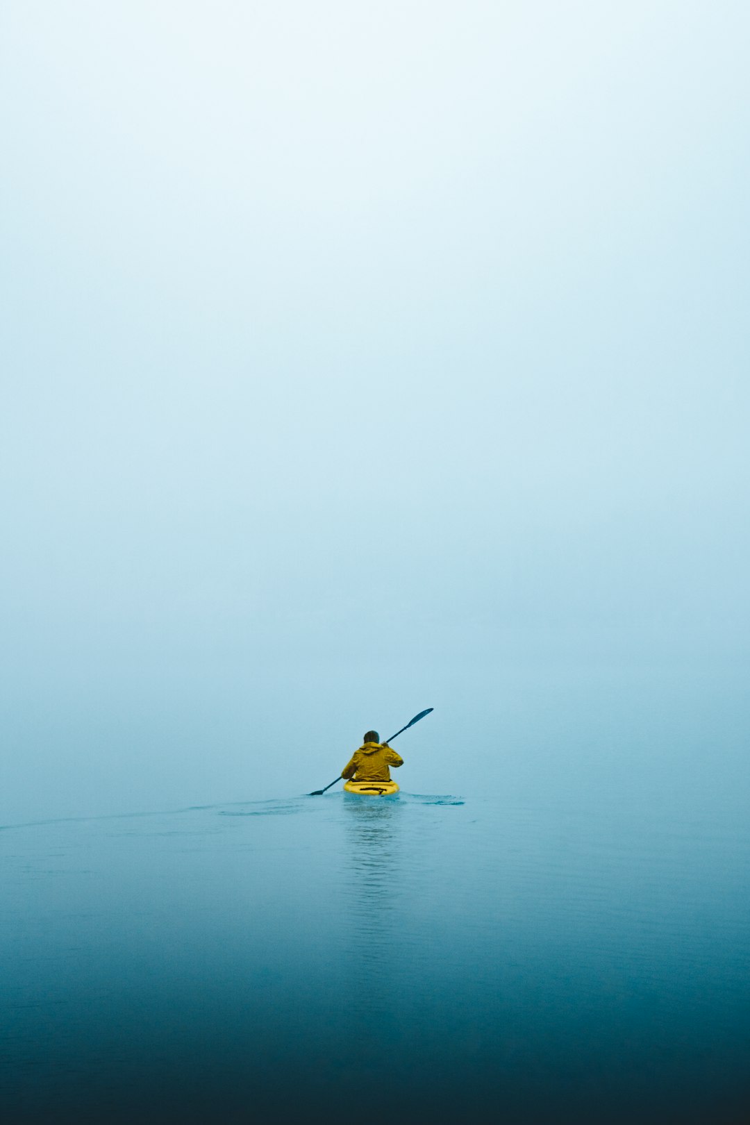 man on kayak during daytime