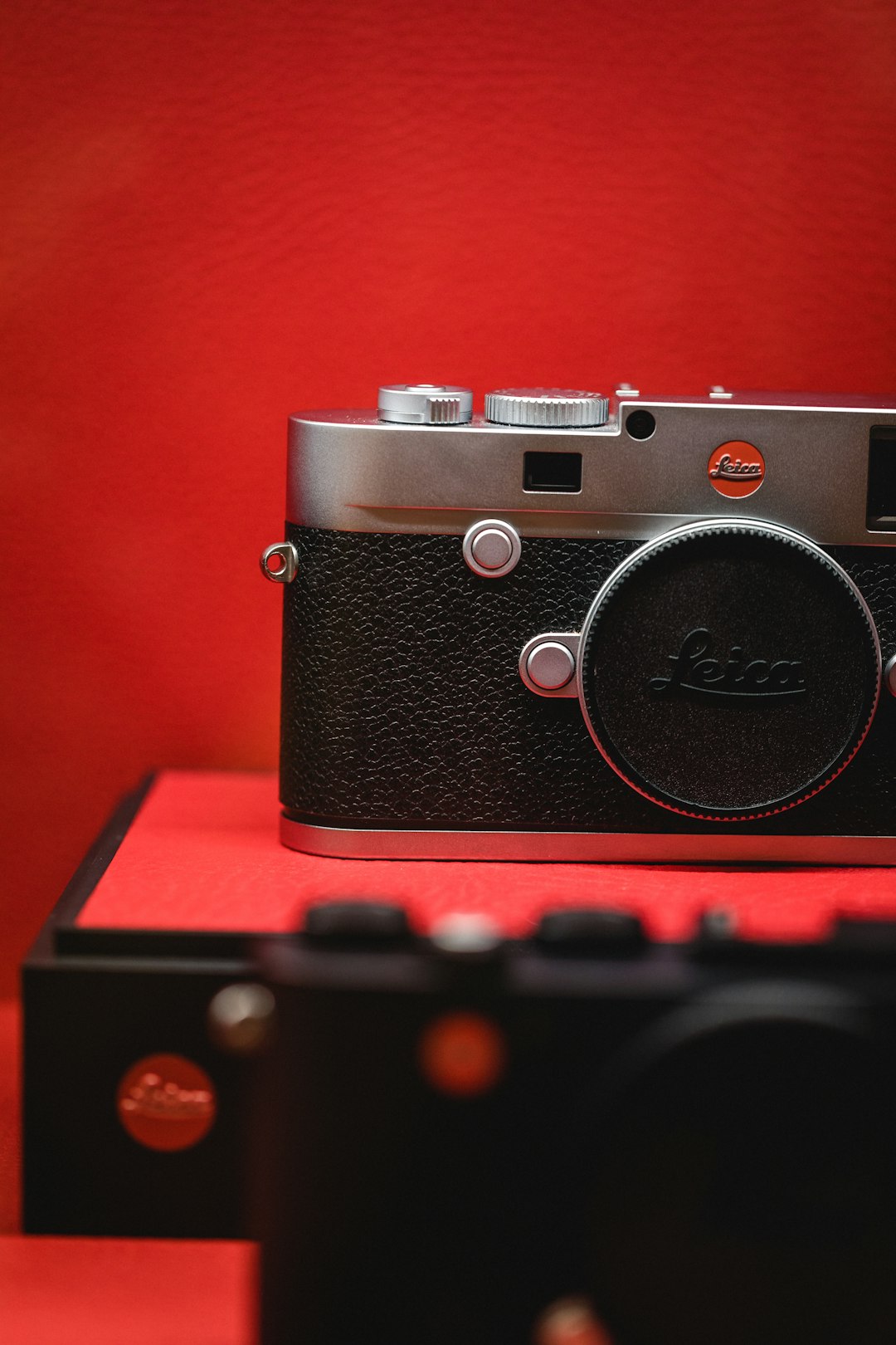 black and gray Leica SLR camera