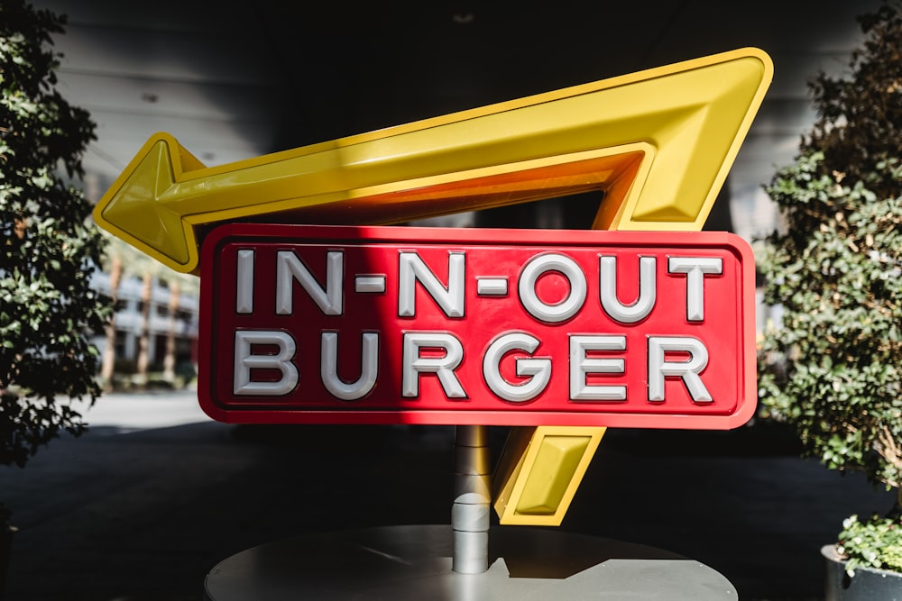 red and yellow In-N-Out Burger sign