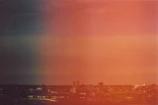 Hand-drawn continuous line art of the Rochester skyline glowing in purple-to-orange gradient.