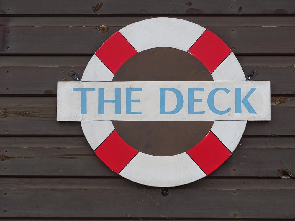 white, red, and blue The Deck hanging decor