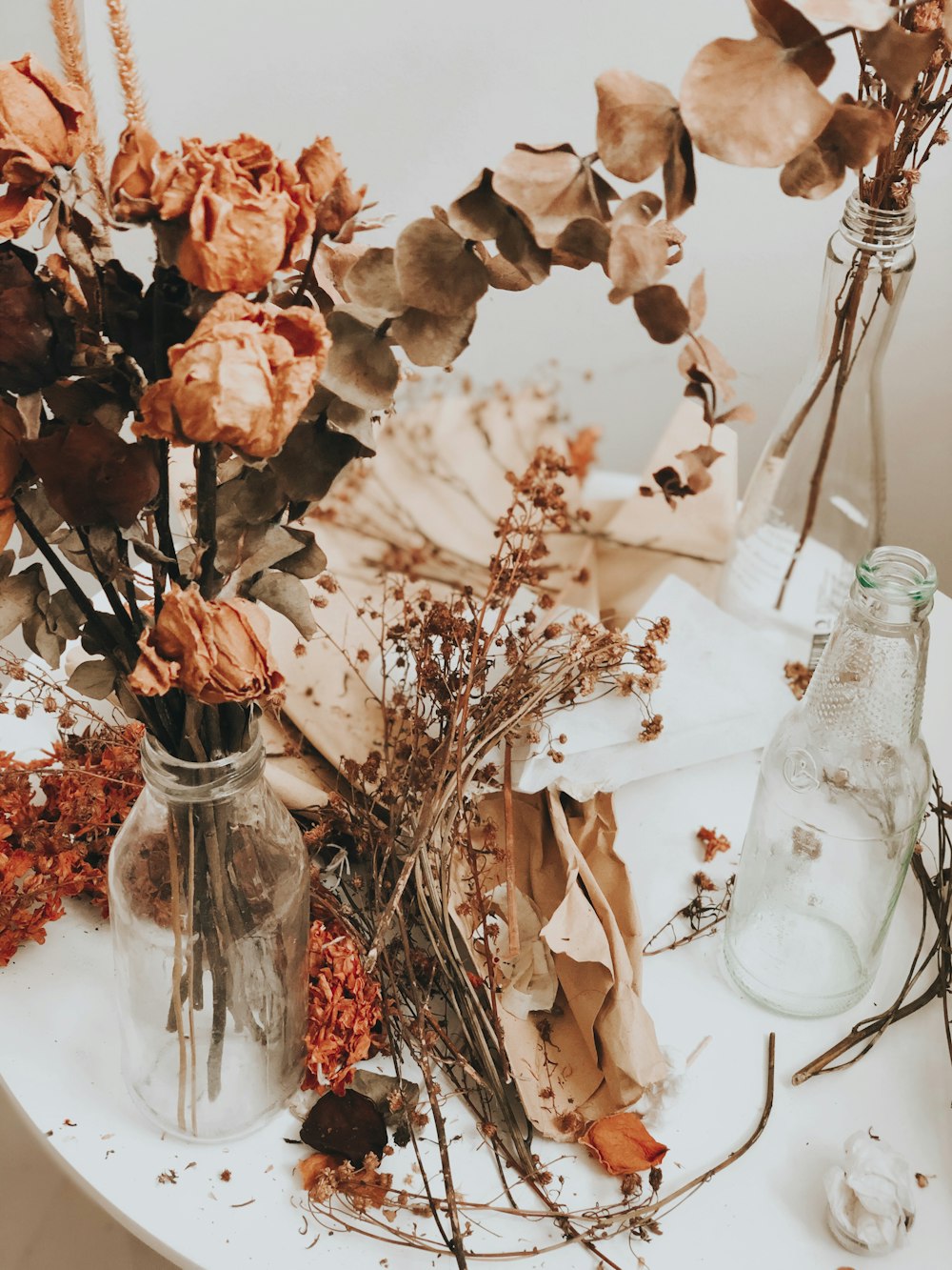 brown and green flowers on vase