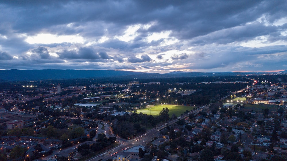 aerial photography of city under cloudy sky