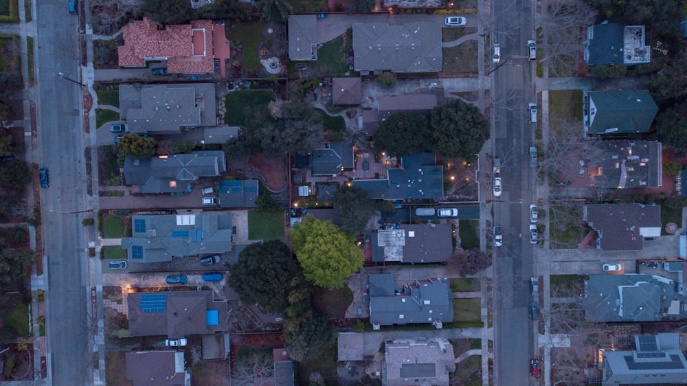 aerial photography of houses beside road