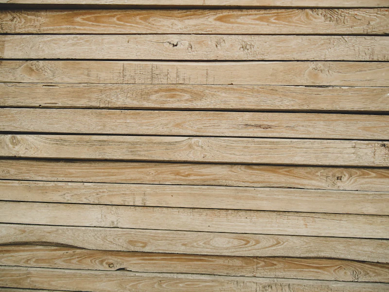 Flat, evenly lit pale board surface. Stock image, placeholder.