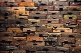 A collection of hardside luggage in various colors displayed together.