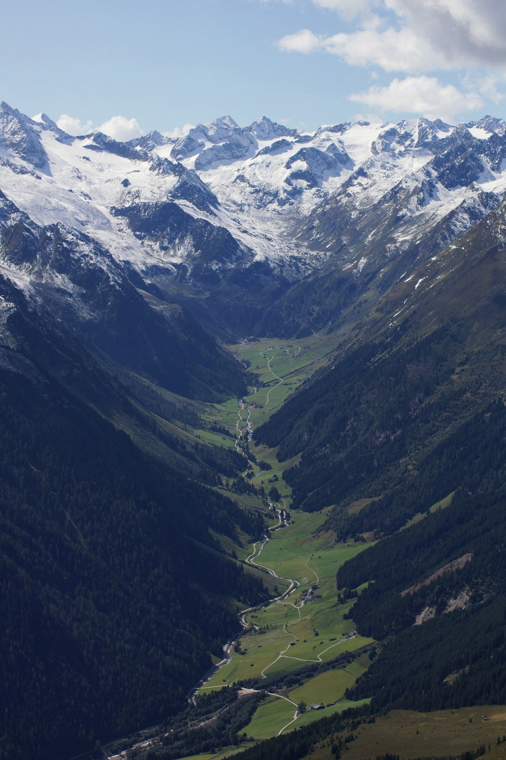 high-angle photography of mountains covered with snow