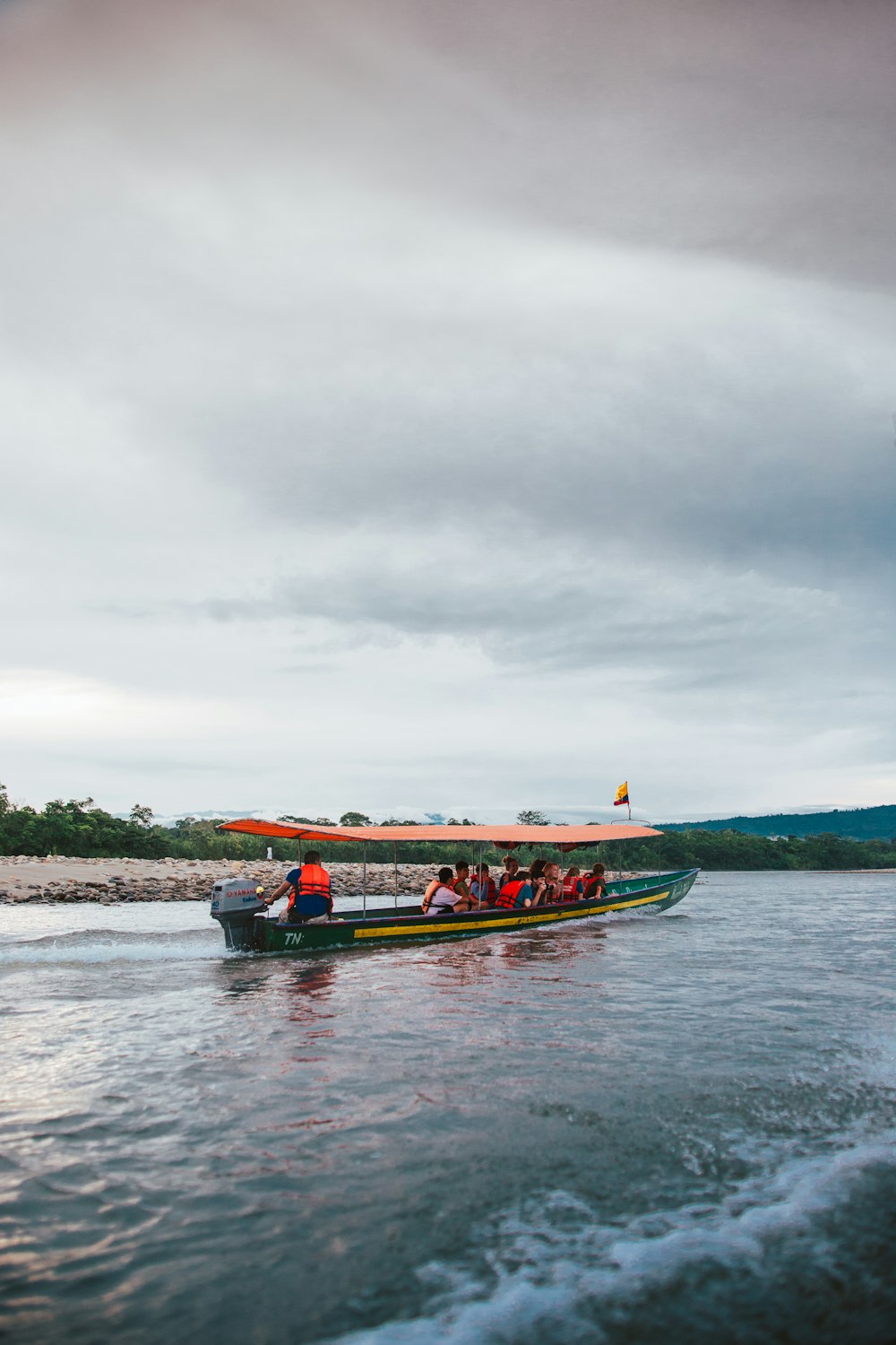 people riding on boat