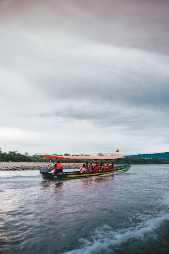 people riding on boat in Tena Ecuador