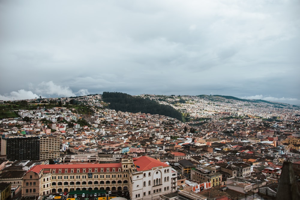 aerial photography of city under cloudy sky