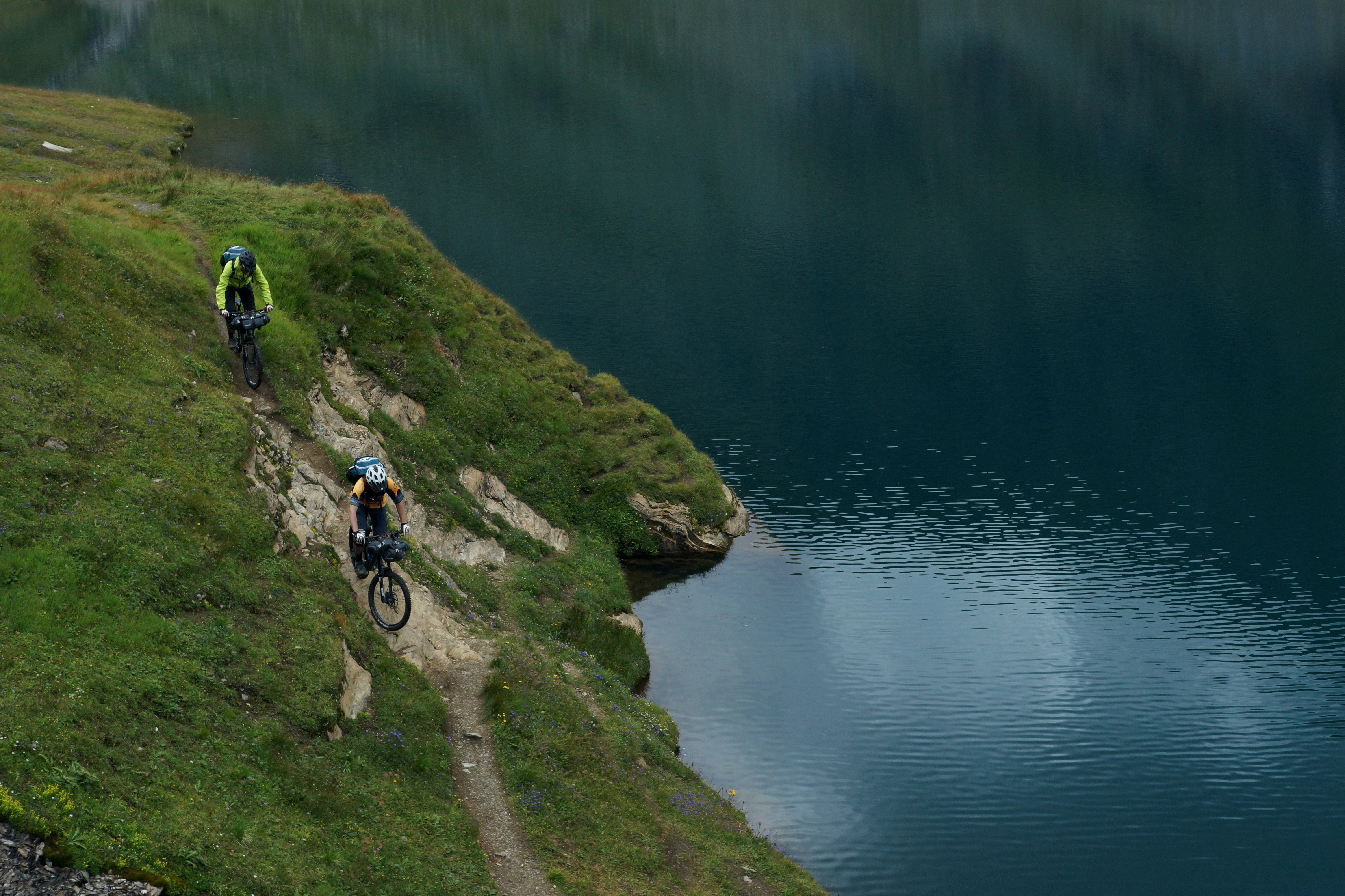 two person riding mountain bike