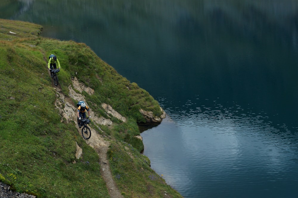 two person riding mountain bike