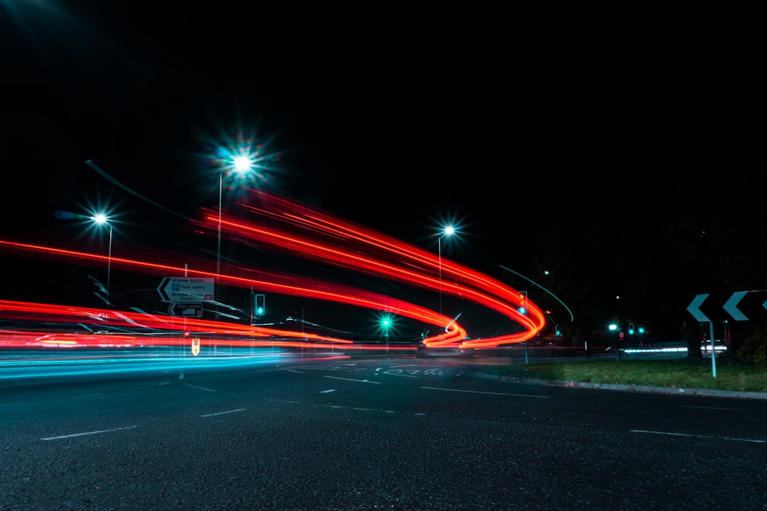 time-lapse photography of road during night time