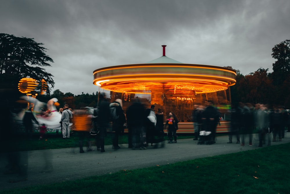 people near horse carousel