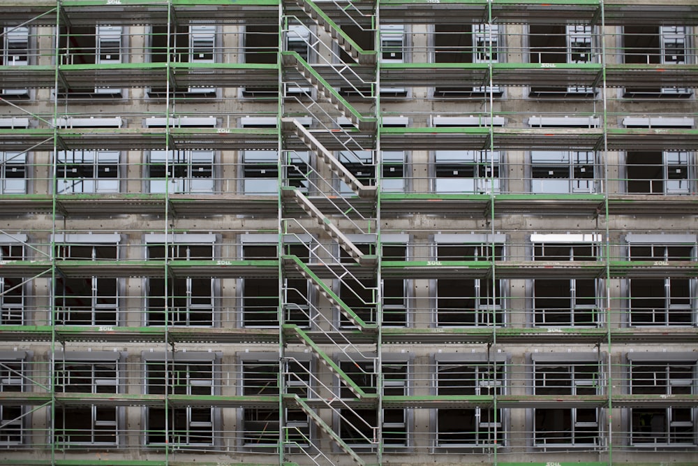 brown and green high-rise building