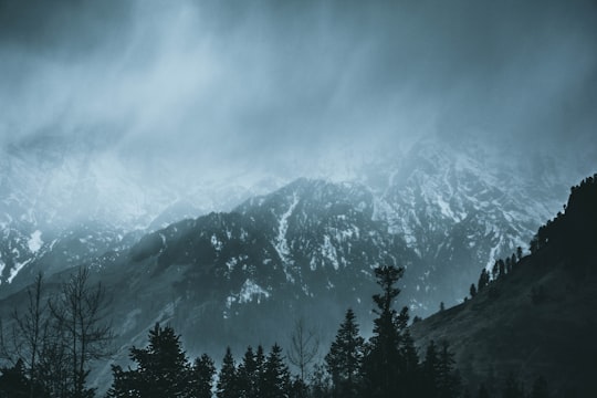 aerial photography of a snowy mountain in Manali India