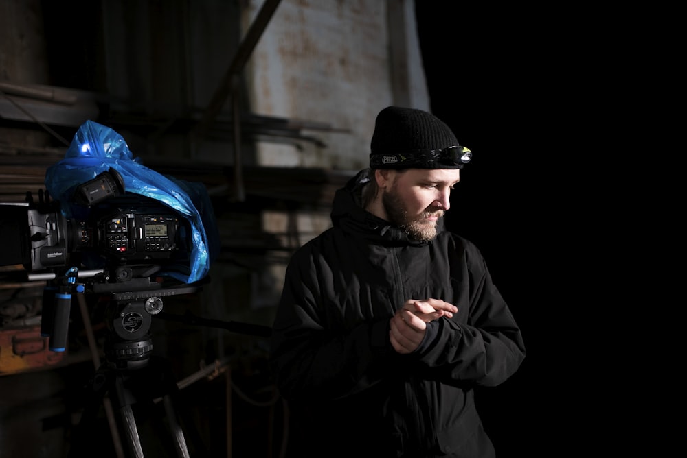 a man standing in front of a camera