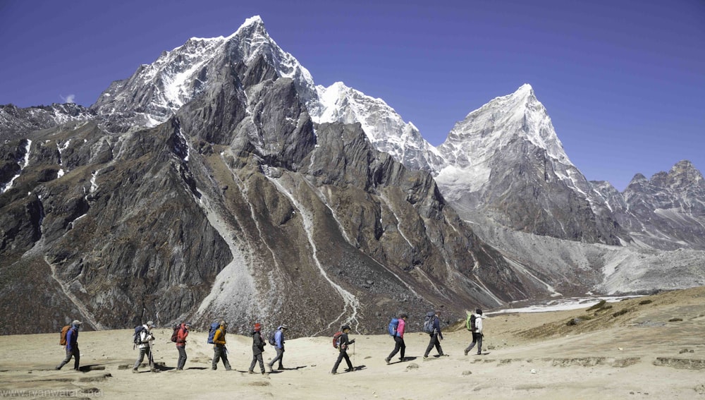 people walking on desert