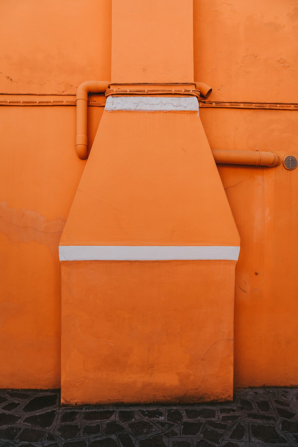 orange and white striped wall