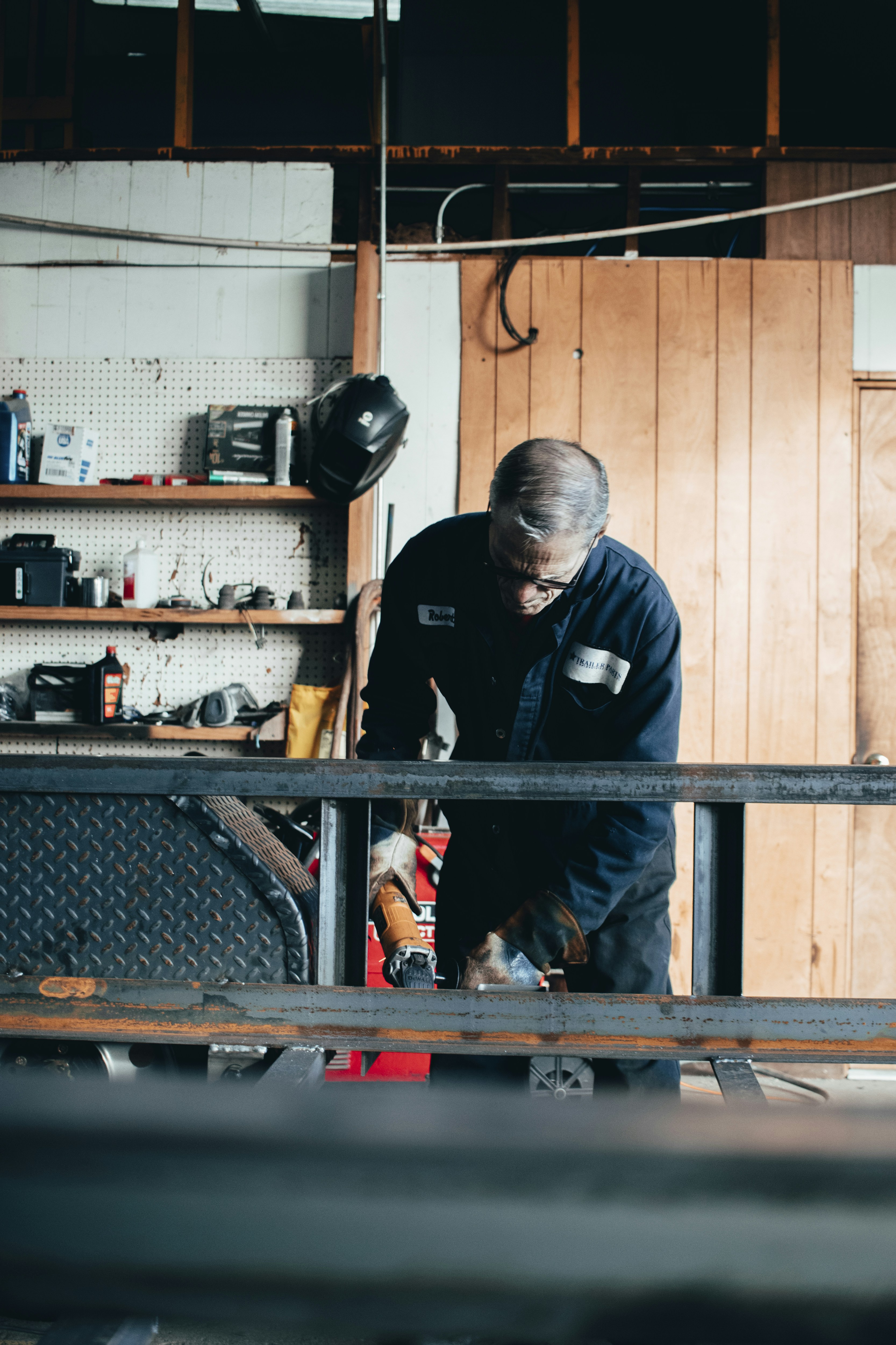man working using a power tool