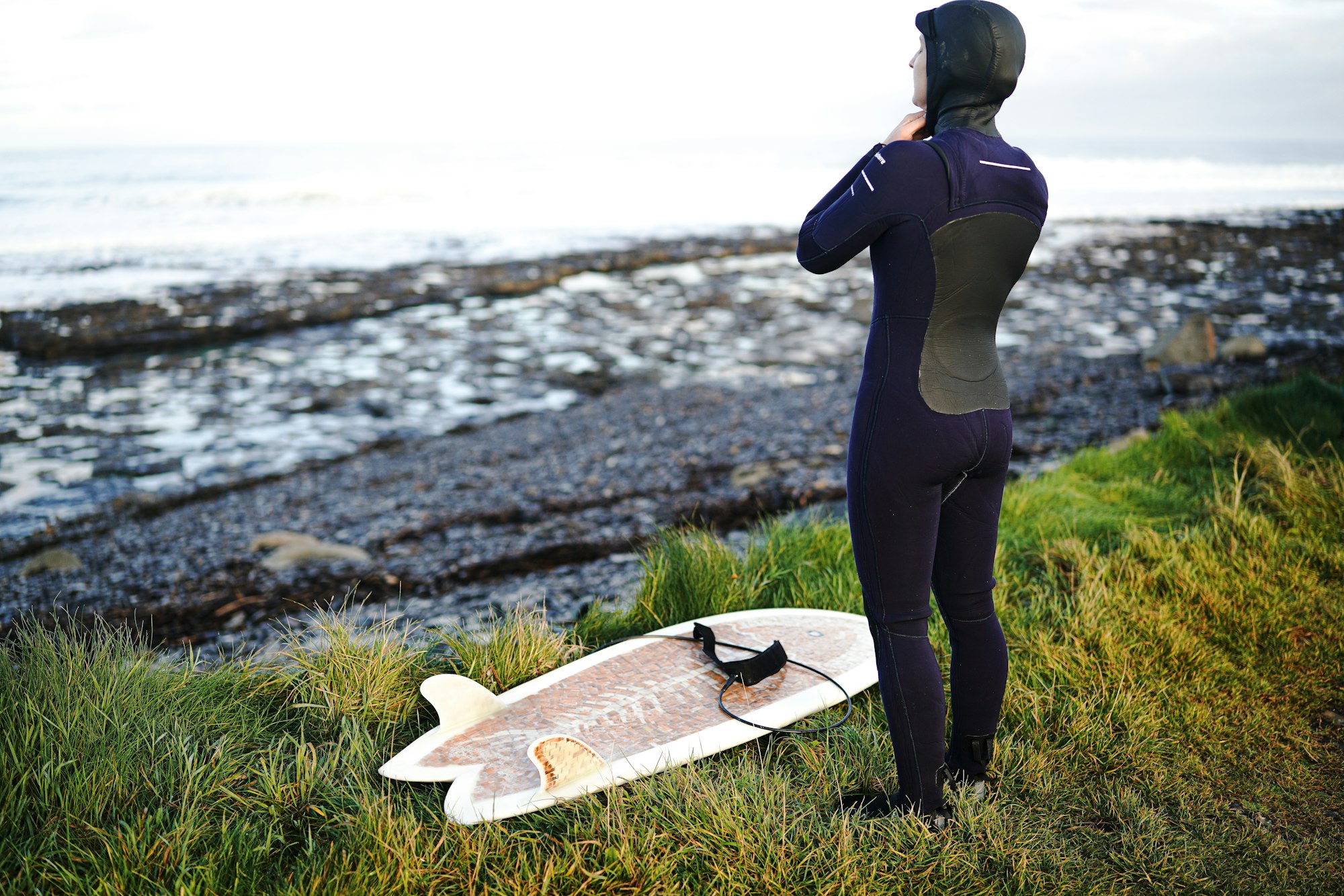 5 time Irish national champ Easkey Britton surfing a surfboard made of 5,000 cigarette butts at Easkey Beach in Ireland