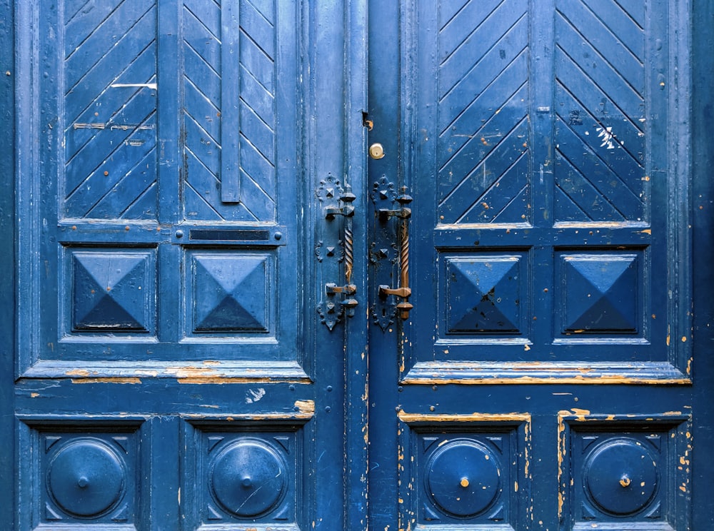 closed blue wooden doors