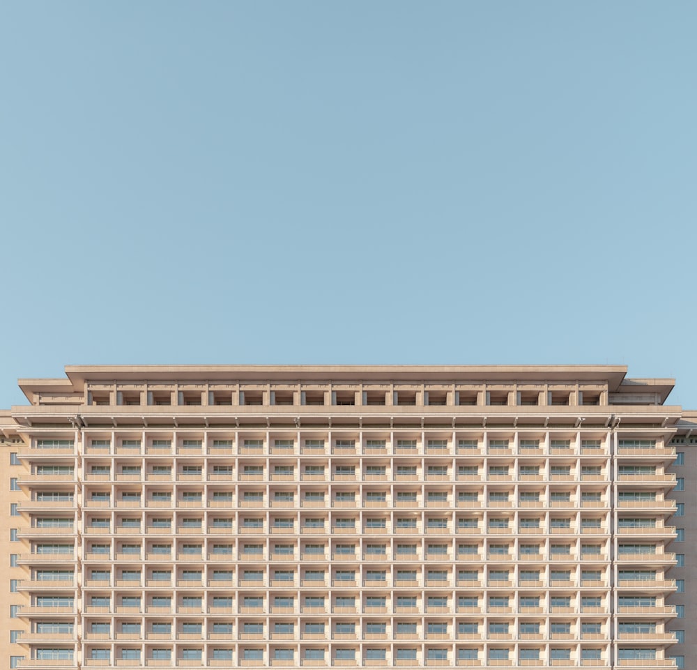 brown building under blue sky