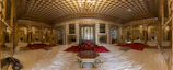 Spacious family suite featuring modern Islamic patterns and plush seating.