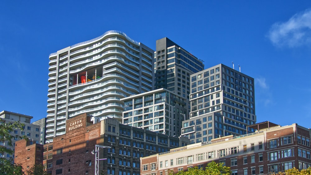 low-angle photography of high-rise urban city buildings