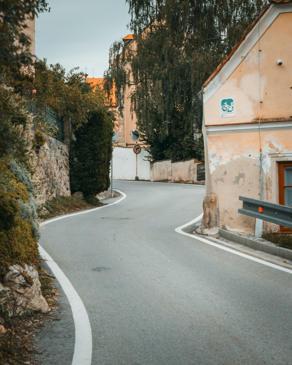 clear winding road during daytime