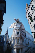 Logo of a fantasy epic showing a dragon curled around a castle.