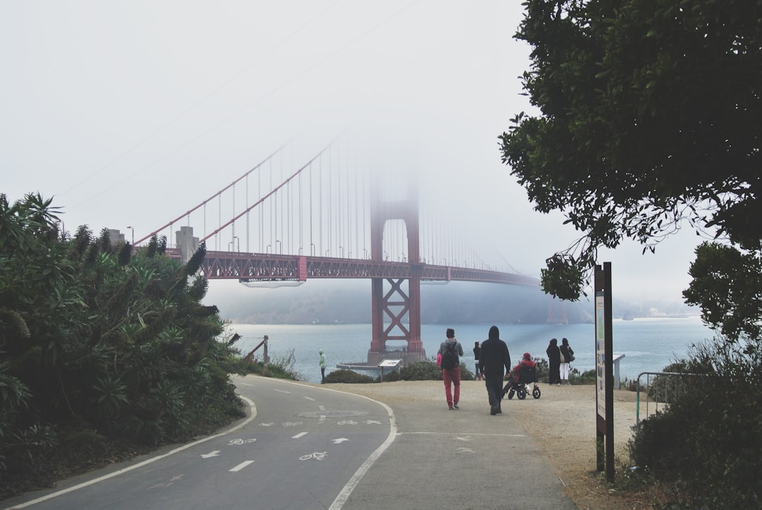people walking near Golden Gate Bridge in San Francisco USA during daytime