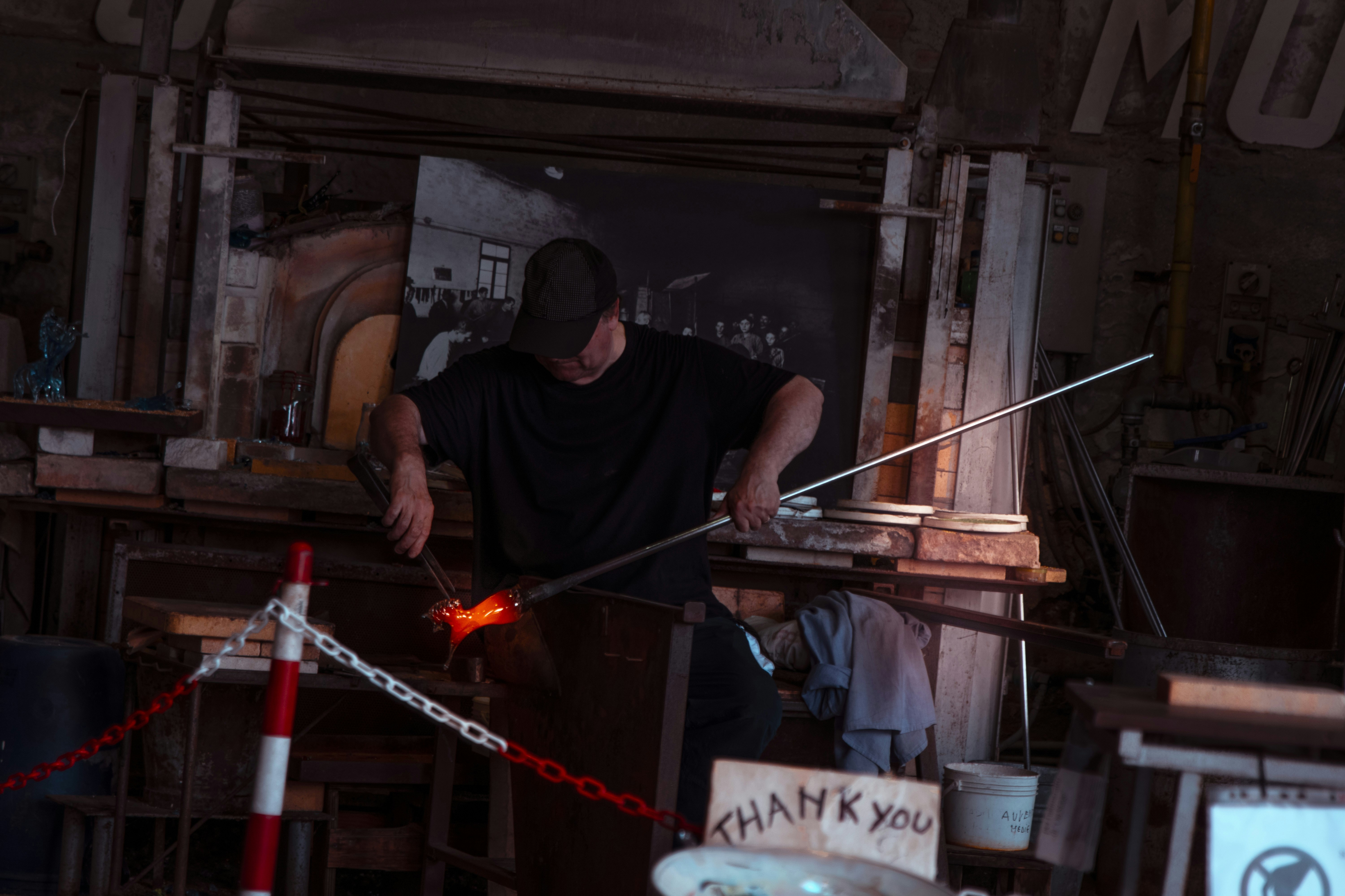 Metal worker crafting traditional lanterns
