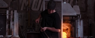 blacksmith standing at the table