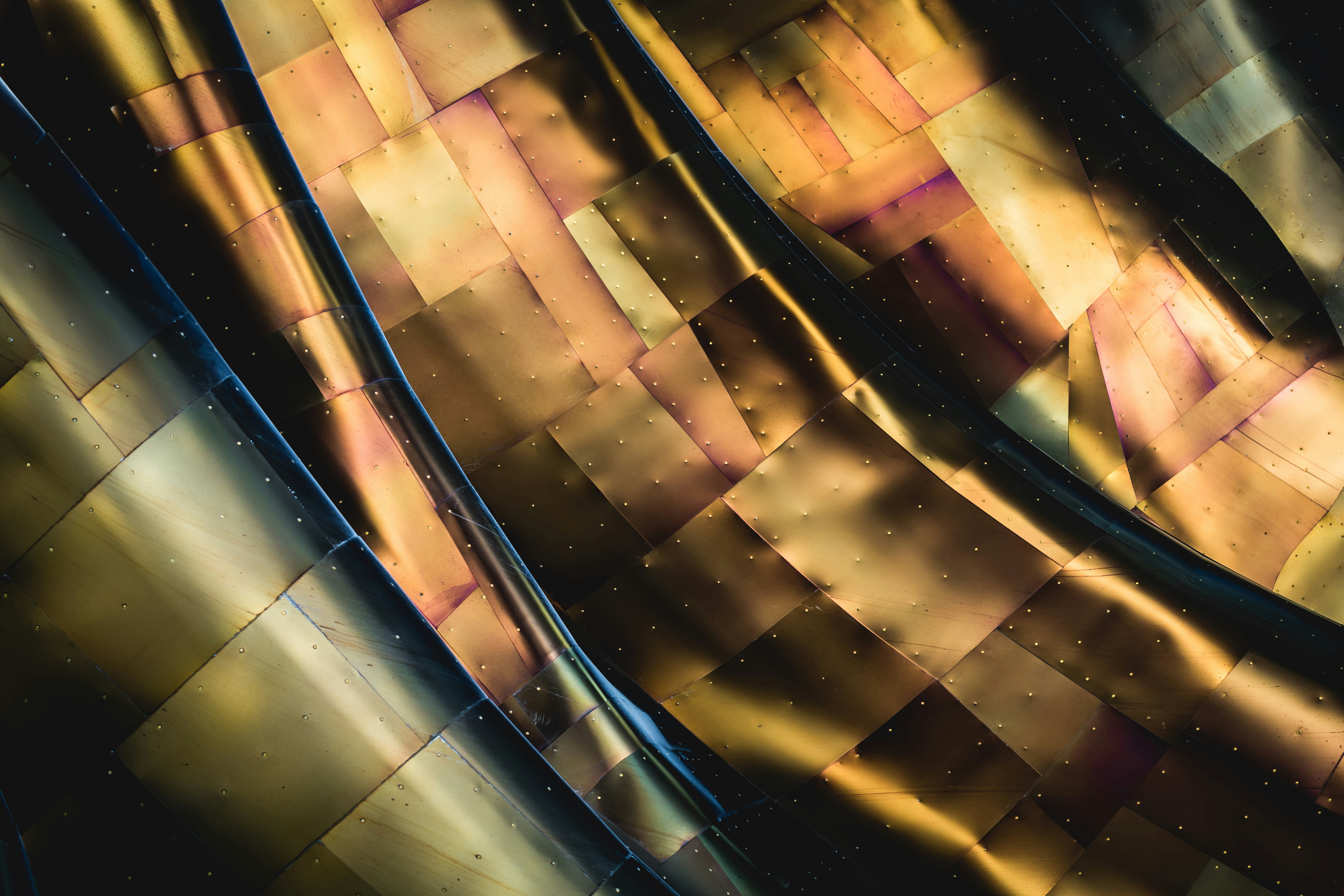 a close up of a shiny metal surface
