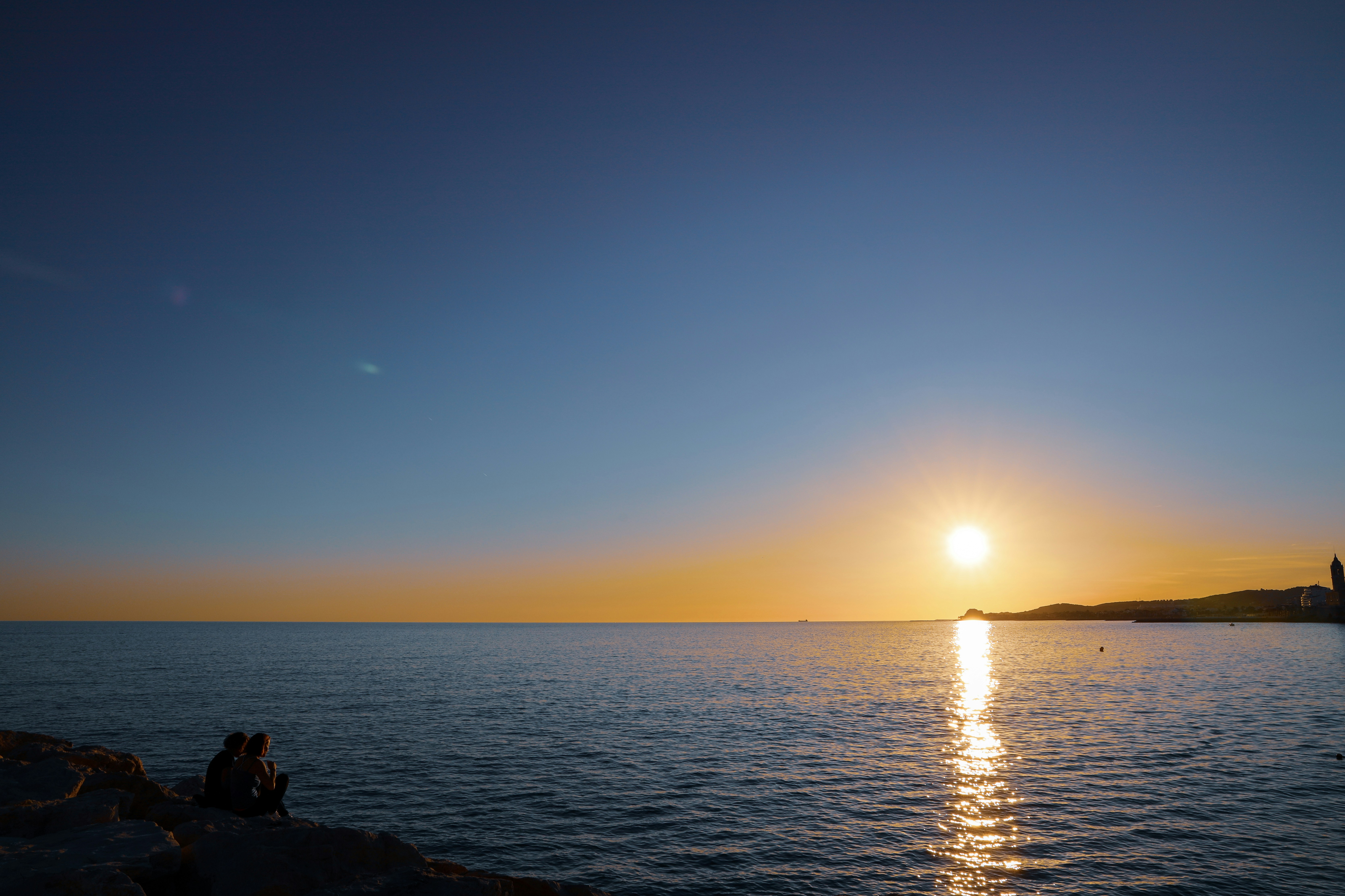blue beach under blue sky, On the Sitges Rocks 